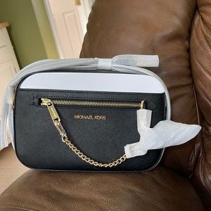 Brand new Michael Kors black purse with gold accents & black shoulder strap